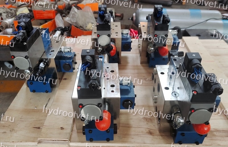 4WRPH6C4B25P–2X/G24Z4/M - Сервораспределитель Ду6 с обратной связью по положению золотника без усилителя, номинальный расход 25 л/мин, характеристика P - прогрессивная, схема C4