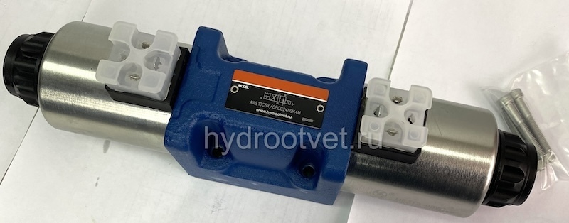 4WE10C5X/OFCG24N9K4/M - Гидрораспределитель золотниковый Ду 10 (серия 5X) с электроуправлением G24, схема C (574/ОФ), возврат - OF = без пружины, с фиксатором