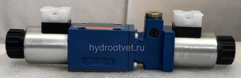 4WEMM6GA6X/CG24N9Z4 - Гидрораспределитель золотниковый Ду6 с электрическим и ручным управлением от рычага, схема GA (64-1), электроуправление G24, возврат - пружинный