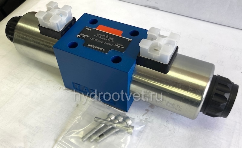 4WE10V31/CG24N9K4 - Гидрораспределитель золотниковый Ду 10 с электроуправлением G24, схема V (124), возврат - пружинный