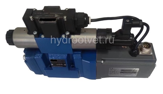 4WRTE10V50L-4X/6EG24K31/A1M - Пропорциональный быстродействующий распределитель с обратной связью по положению золотника и со встроенным усилителем (OBE), Ду10, A1 = ±10 В, номинальный расход 50 л/мин, схема V, каналы управления X и Y = внешние