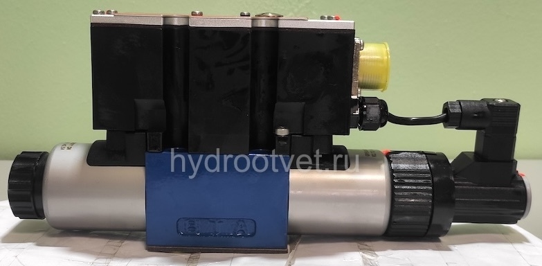 4WREE6E08-2X/G24K31/A1V - Пропорциональный распределитель с обратной связью по положению золотника со встроенным усилителем Ду6, A1 = ±10 В, номинальный расход 8 л/мин, схема E