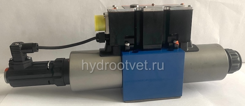 4WREE10W1-50-2X/G24K31/A1V - Пропорциональный распределитель с обратной связью по положению золотника со встроенным усилителем Ду10, A1 = ±10 В, номинальный расход 50 л/мин, схема W1-
