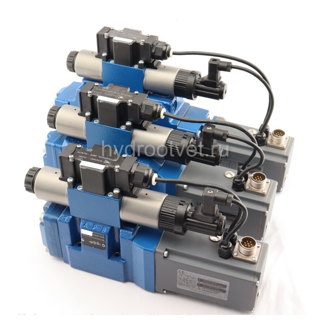 4WRTE10E100L-4X/6EG24ETK31/A1M - Пропорциональный быстродействующий распределитель с обратной связью по положению золотника и со встроенным усилителем (OBE), Ду10, A1 = ±10 В, номинальный расход 100 л/мин, схема E, каналы управления ET = X и Y - внутренни