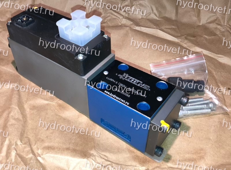 4WRPH6C3B24L–2X/G24Z4/M - Сервораспределитель Ду6 с обратной связью по положению золотника без усилителя, номинальный расход 24 л/мин, характеристика L - линейная, схема C3