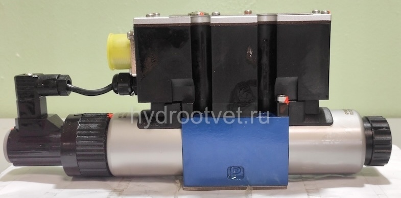 4WREE6E16-2X/G24K31/A1V - Пропорциональный распределитель с обратной связью по положению золотника со встроенным усилителем Ду6, A1 = ±10 В, номинальный расход 16 л/мин, схема E