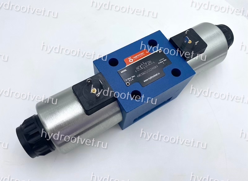 4WE10M31/CG24N9K4 - Гидрораспределитель золотниковый Ду 10 с электроуправлением G24, схема M (24), возврат - пружинный