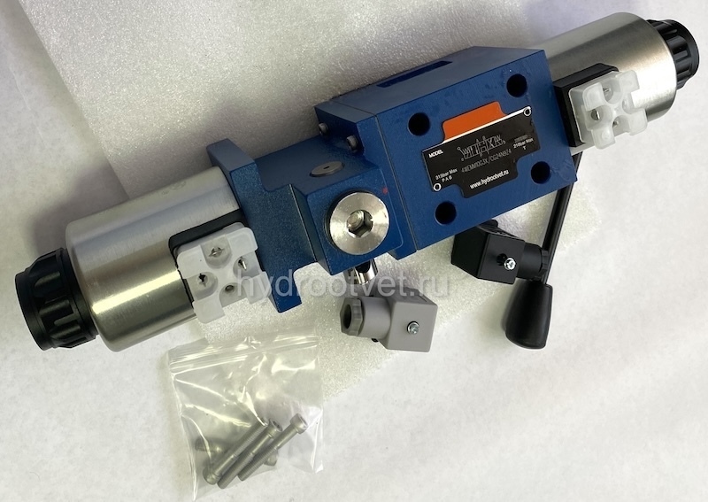 4WEMM10JA3X/CG24N9Z4 - Гидрораспределитель золотниковый Ду10 с электрическим и ручным управлением от рычага, схема JA (34-1), электроуправление G24, возврат - пружинный